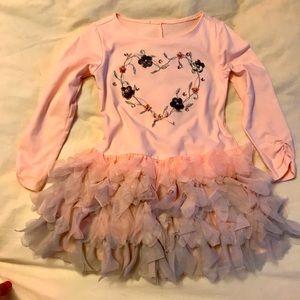 Girl’s adorable ruffled dress